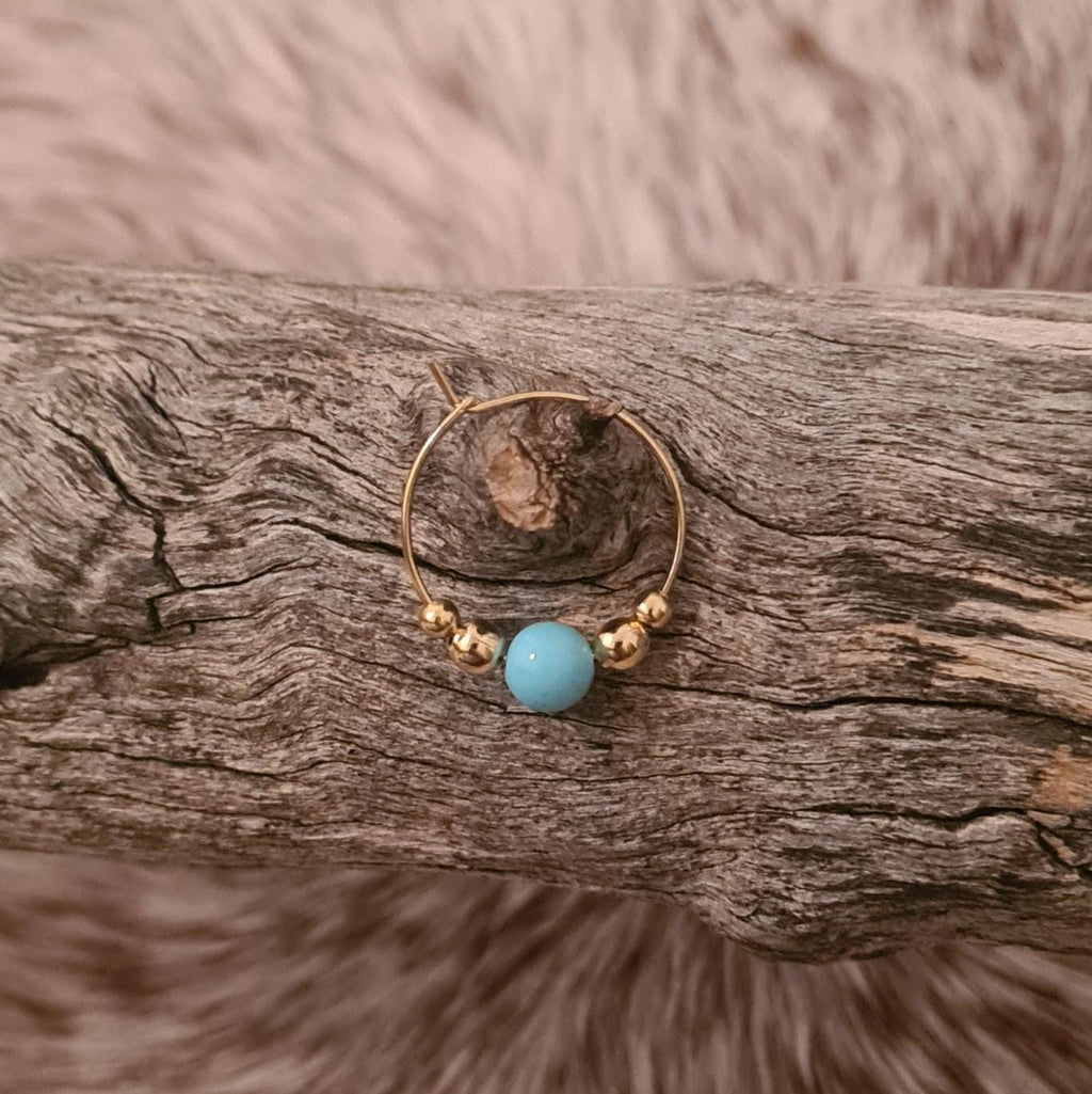 All That Glitters genuine turquoise and gold hoop earrings.