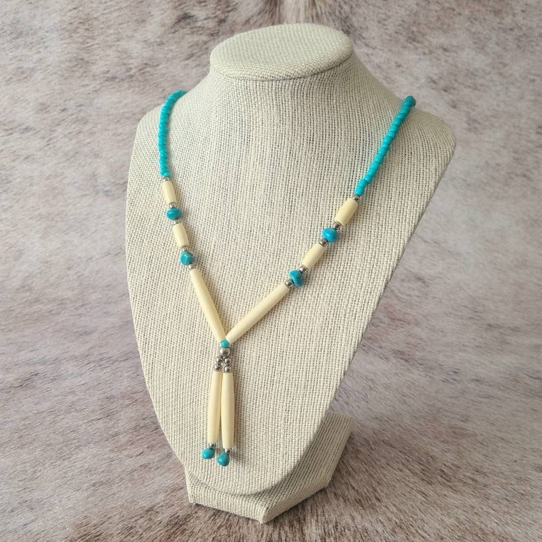 Spirit of the West Native bone and turquoise beaded necklace.