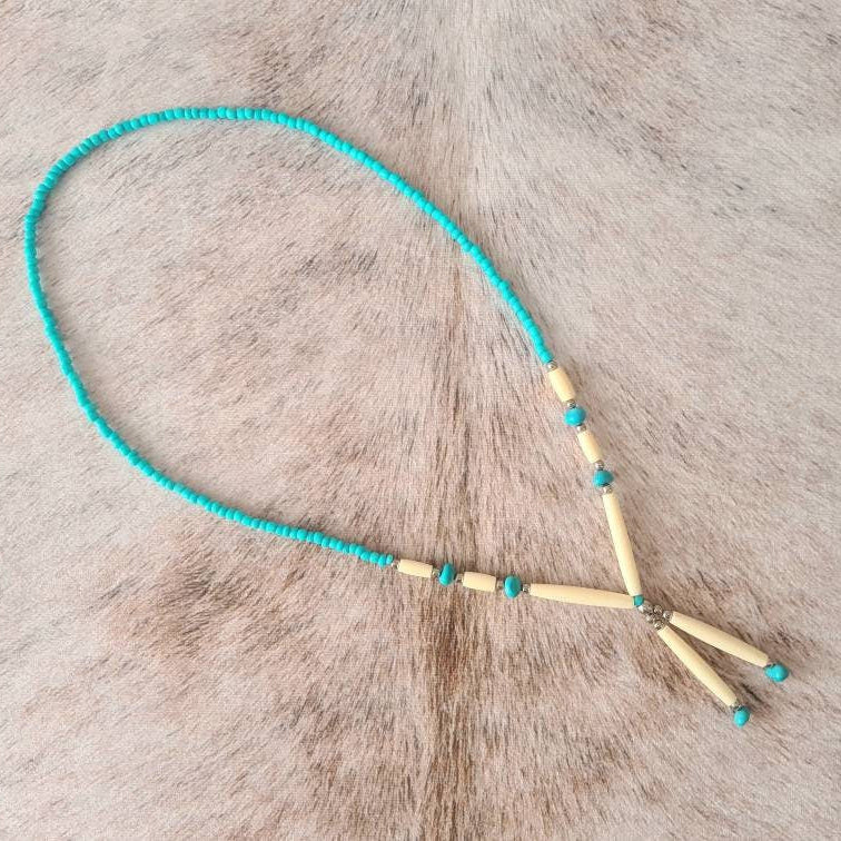 Spirit of the West Native bone and turquoise beaded necklace.