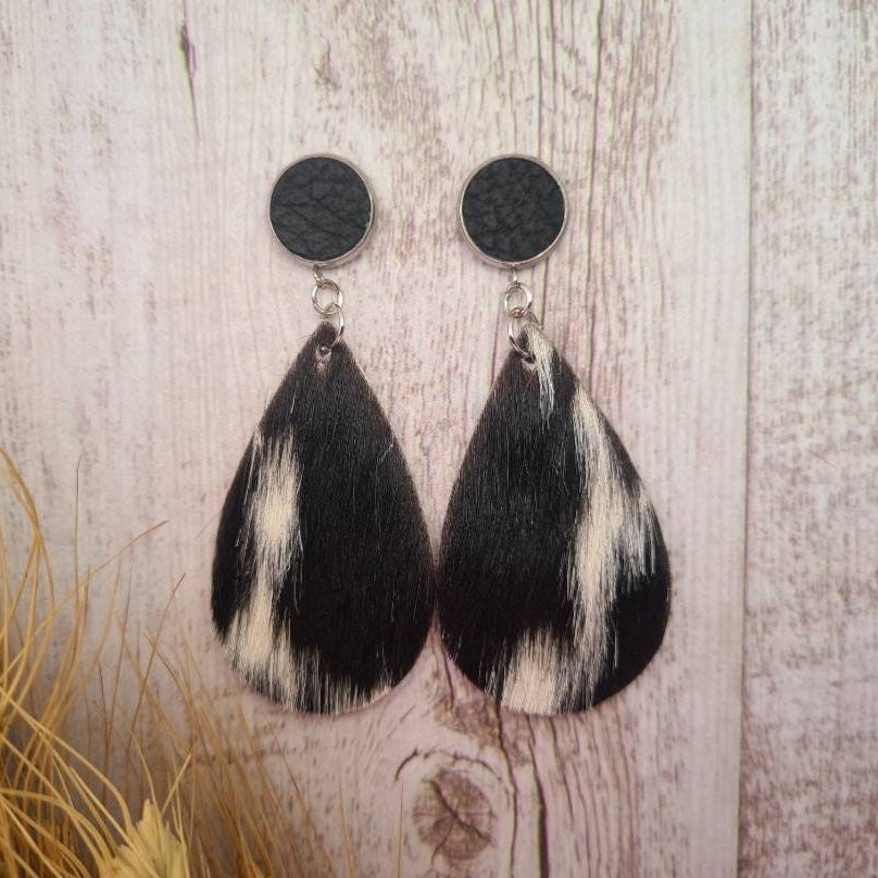 Roughstock genuine leather and genuine cowhide teardrop earrings.