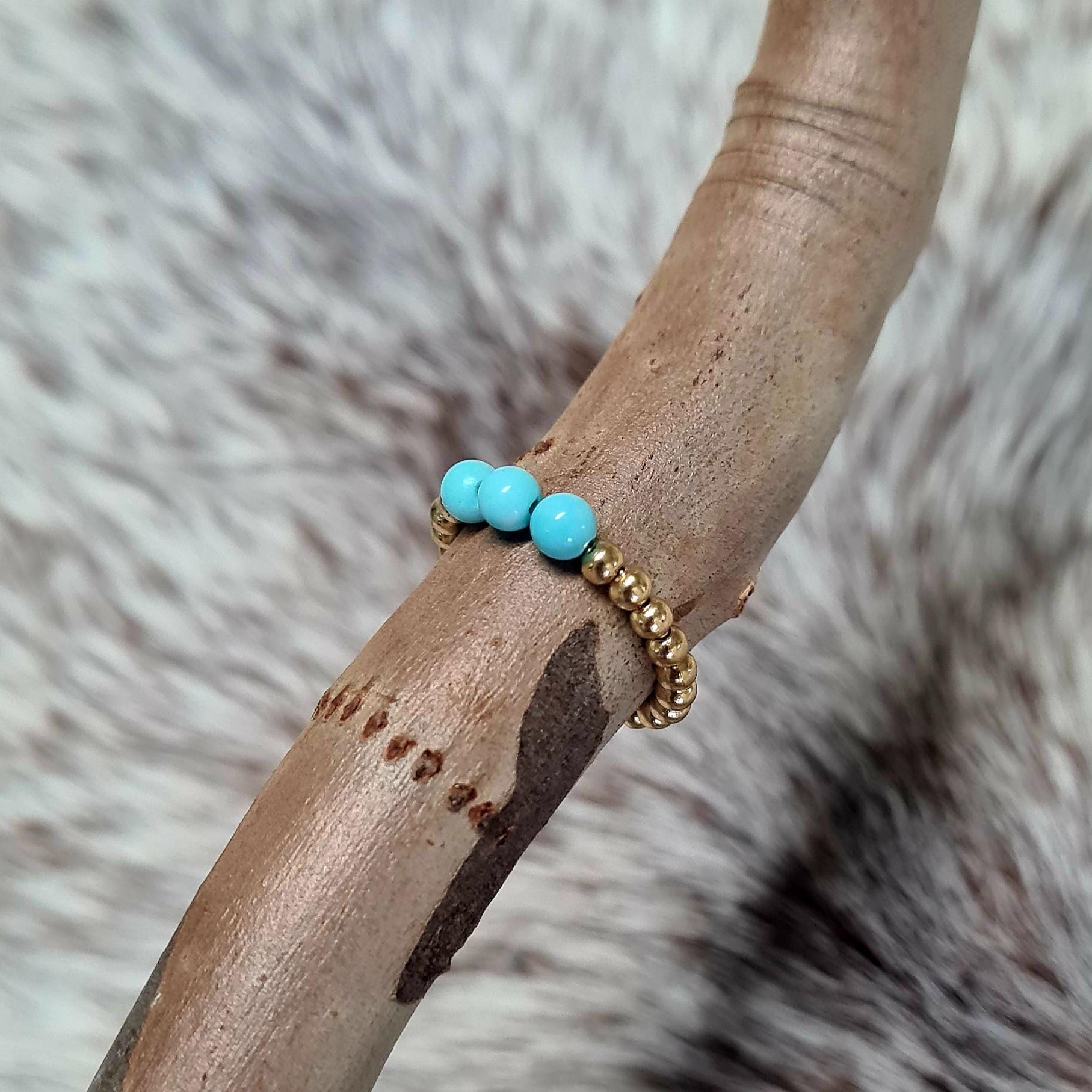 Last Call genuine turquoise beaded ring in gold.