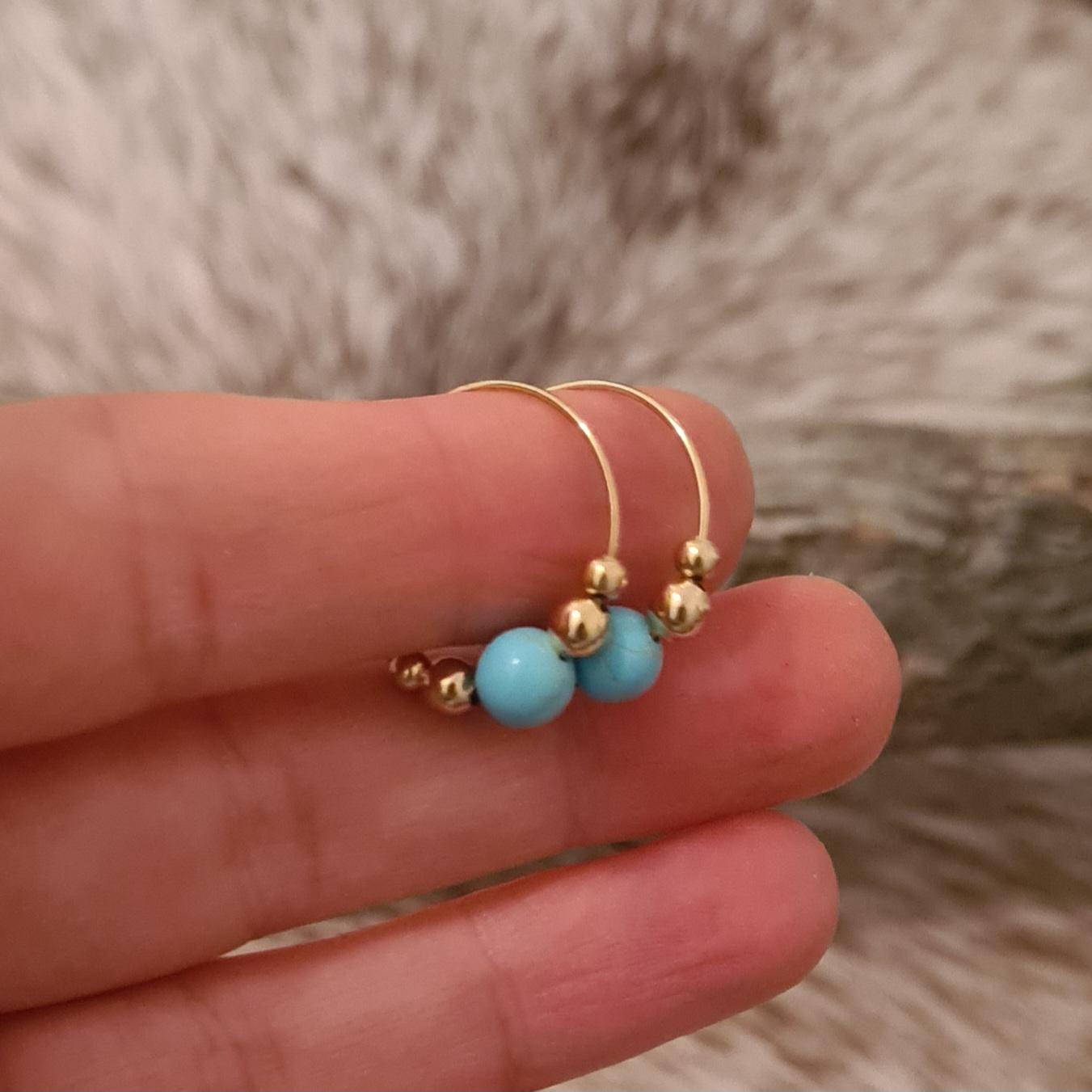 All That Glitters genuine turquoise and gold hoop earrings.