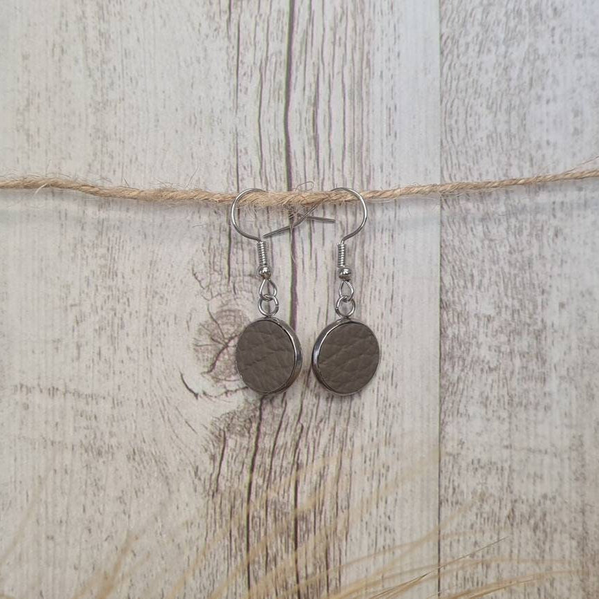 Riding Tall genuine leather short dangle earrings.