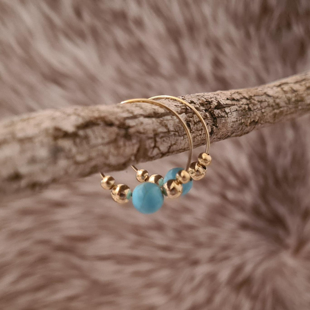 All That Glitters genuine turquoise and gold hoop earrings.