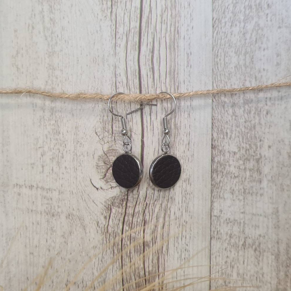 Riding Tall genuine leather short dangle earrings.