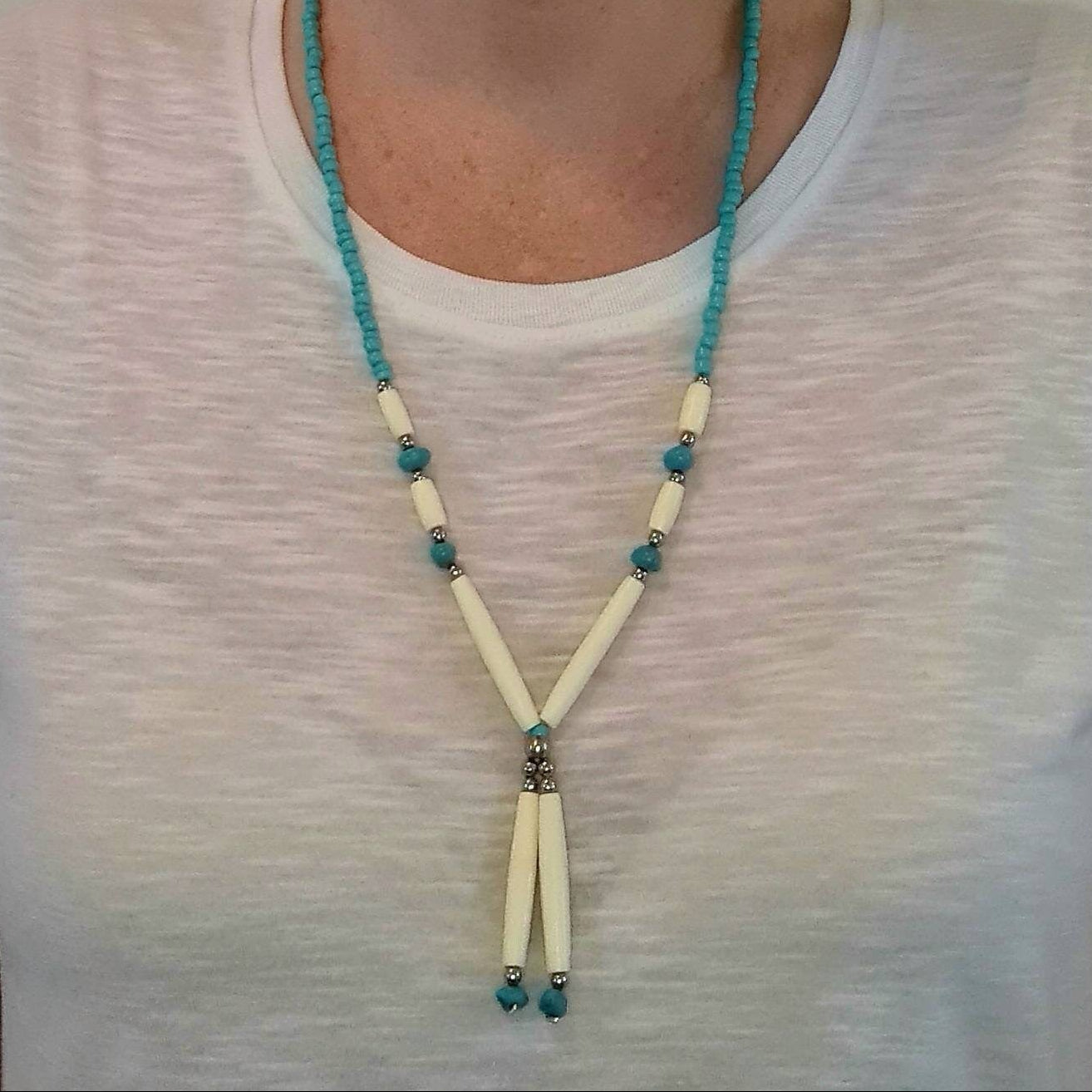 Spirit of the West Native bone and turquoise beaded necklace.