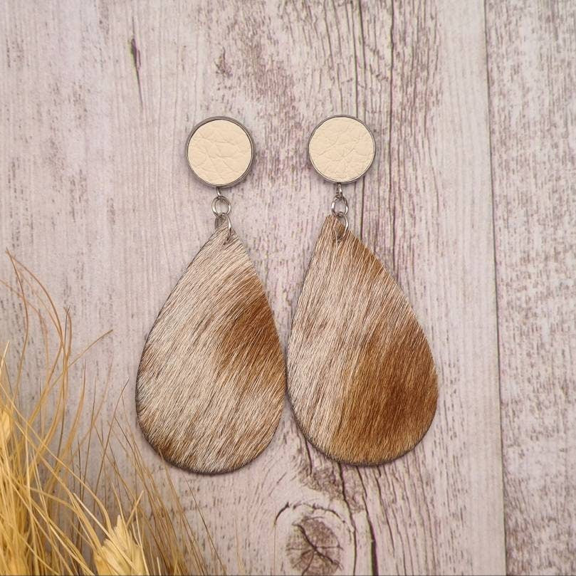 Roughstock genuine leather and genuine cowhide teardrop earrings.
