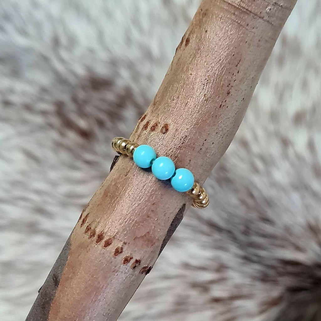 Last Call genuine turquoise beaded ring in gold.