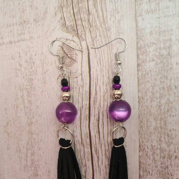 Sweetheart of the Rodeo long dangle amethyst earrings.