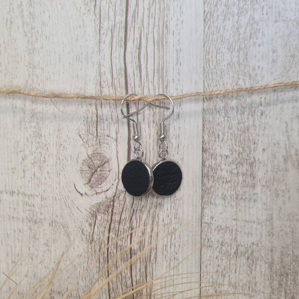 Riding Tall genuine leather short dangle earrings.