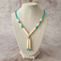 Spirit of the West Native bone and turquoise beaded necklace.