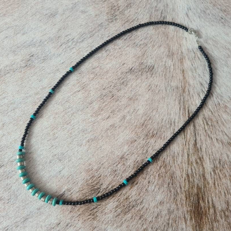 Cowgirl Tough turquoise and steel beaded necklace.