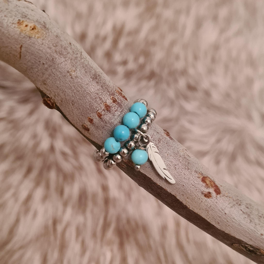 Buffalo River genuine turquoise and stainless steel beaded ring.