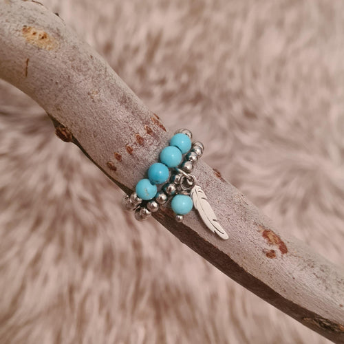 Buffalo River genuine turquoise and stainless steel beaded ring.