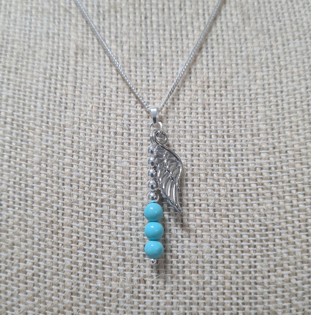 More Than Angels sterling silver and genuine turquoise Angelman Syndrome Awareness necklace.
