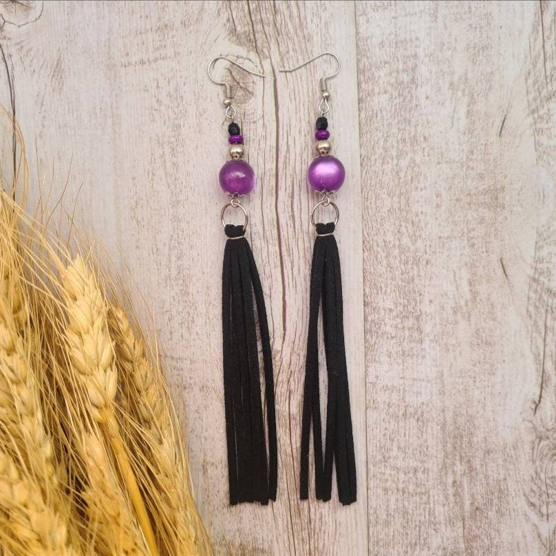 Sweetheart of the Rodeo long dangle amethyst earrings.