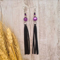 Sweetheart of the Rodeo long dangle amethyst earrings.