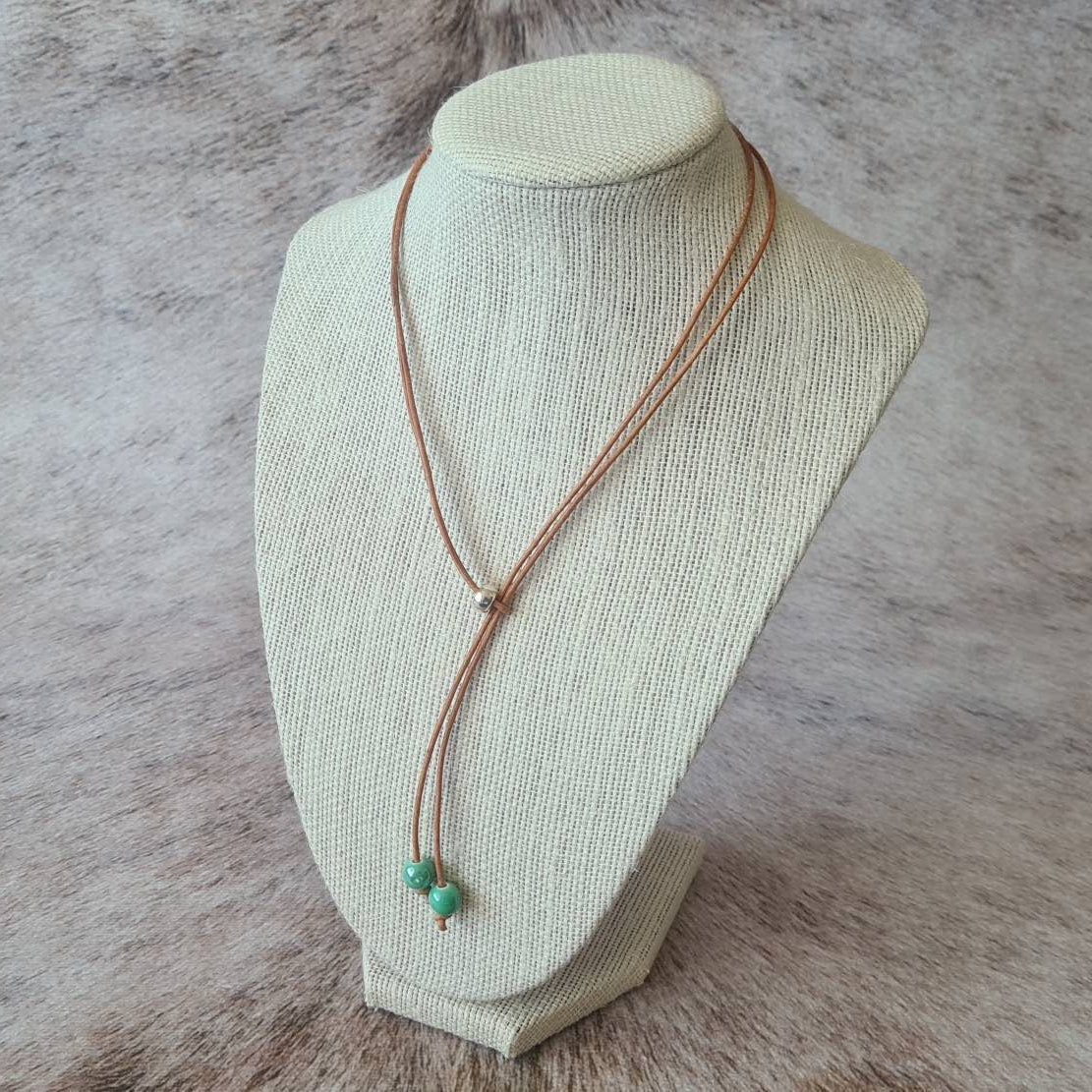 Spring Roundup leather bolo style Y necklace.