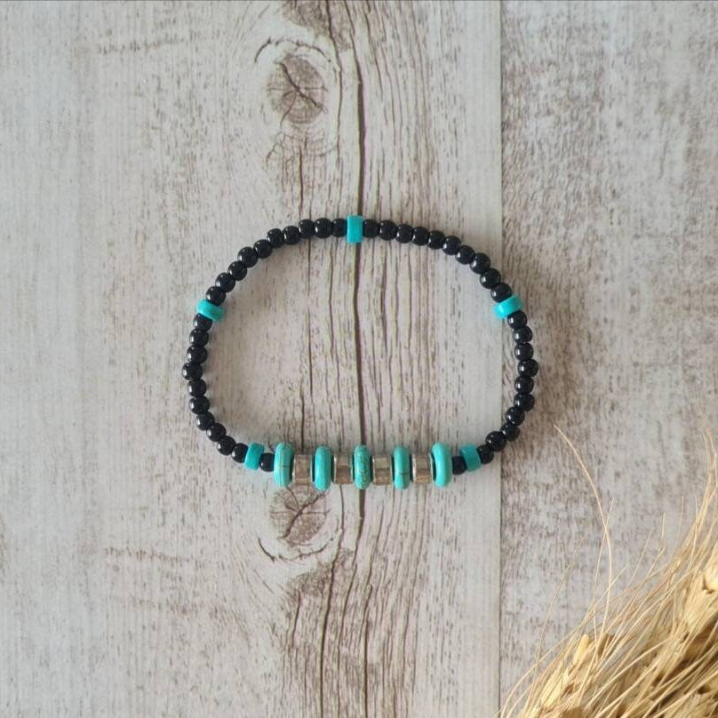 Cowgirl Tough turquoise and steel beaded bracelet.