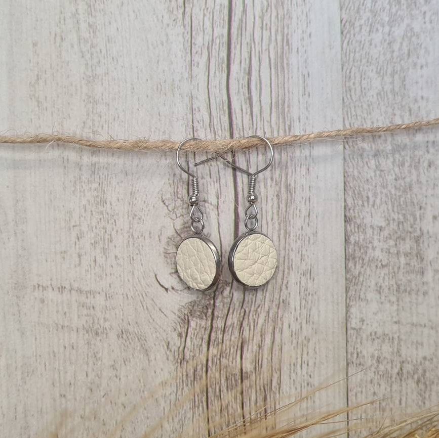 Riding Tall genuine leather short dangle earrings.