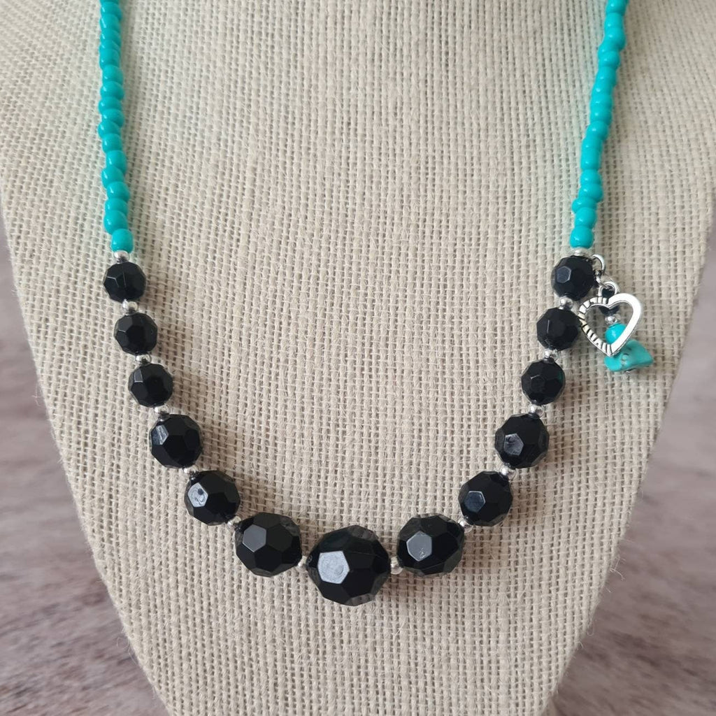 Cross My Heart beaded necklace with turquoise chip and heart charm.
