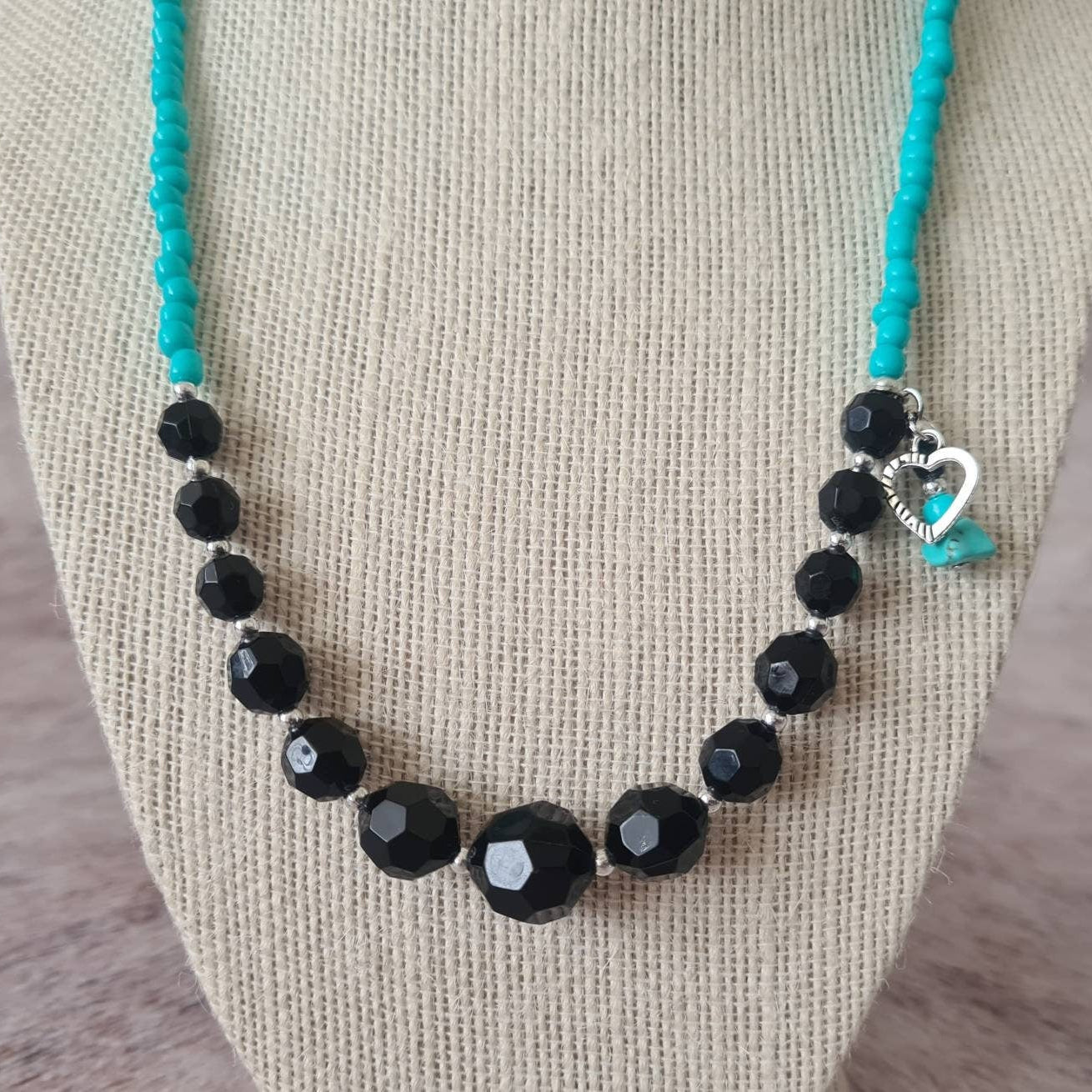 Cross My Heart beaded necklace with turquoise chip and heart charm.