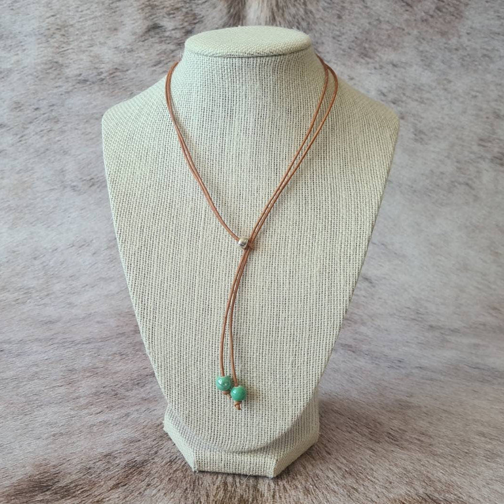 Spring Roundup leather bolo style Y necklace.