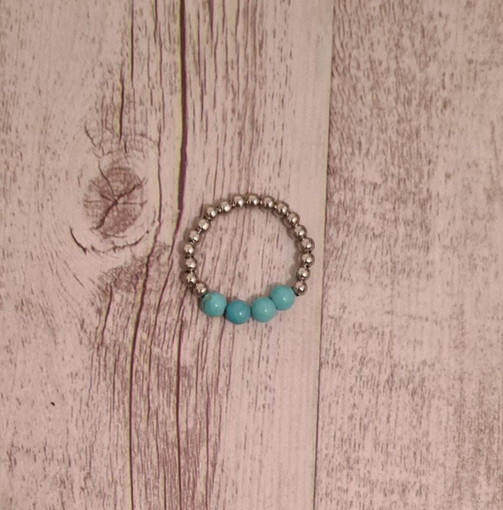 Buffalo River genuine turquoise and stainless steel beaded ring.