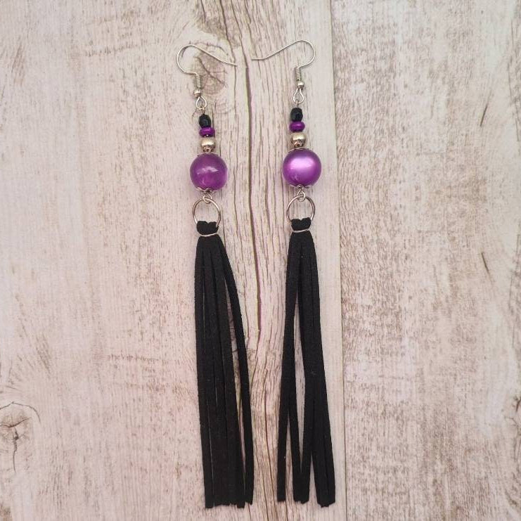Sweetheart of the Rodeo long dangle amethyst earrings.