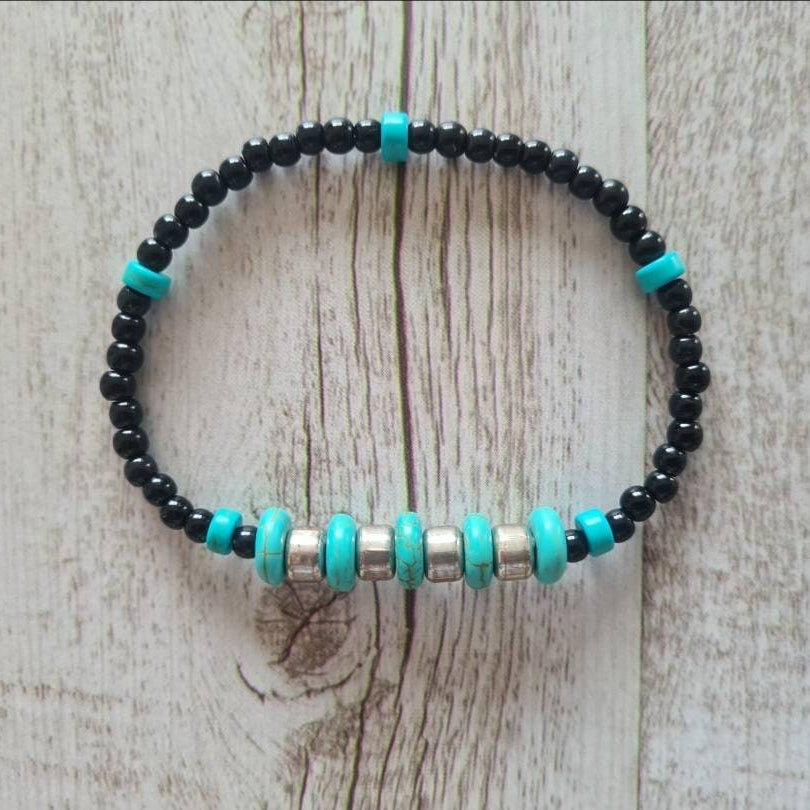 Cowgirl Tough turquoise and steel beaded bracelet.