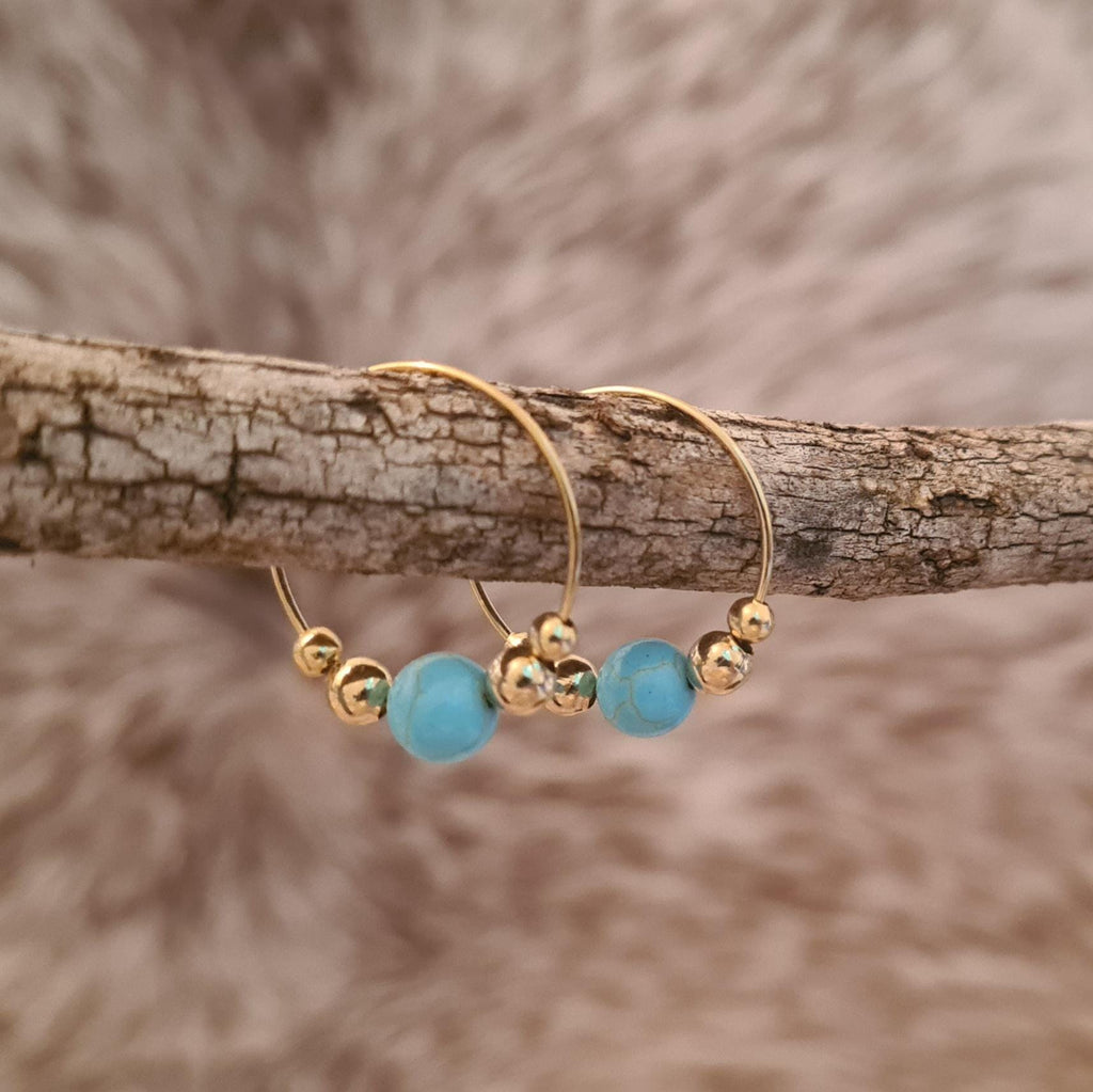 All That Glitters genuine turquoise and gold hoop earrings.