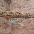 All That Glitters genuine turquoise and gold hoop earrings.