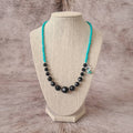 Cross My Heart beaded necklace with turquoise chip and heart charm.