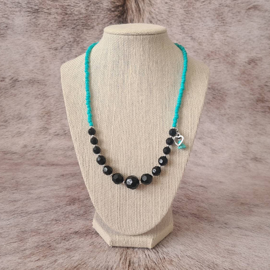 Cross My Heart beaded necklace with turquoise chip and heart charm.