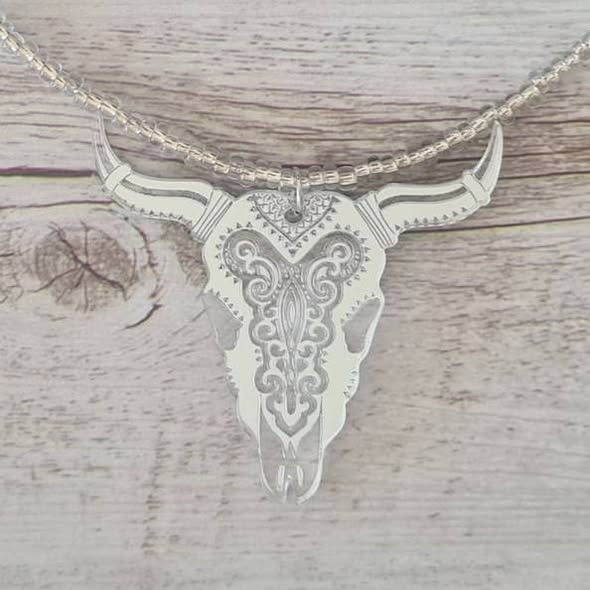 Grand Entry beaded necklace with mirrored steer skull pendant.
